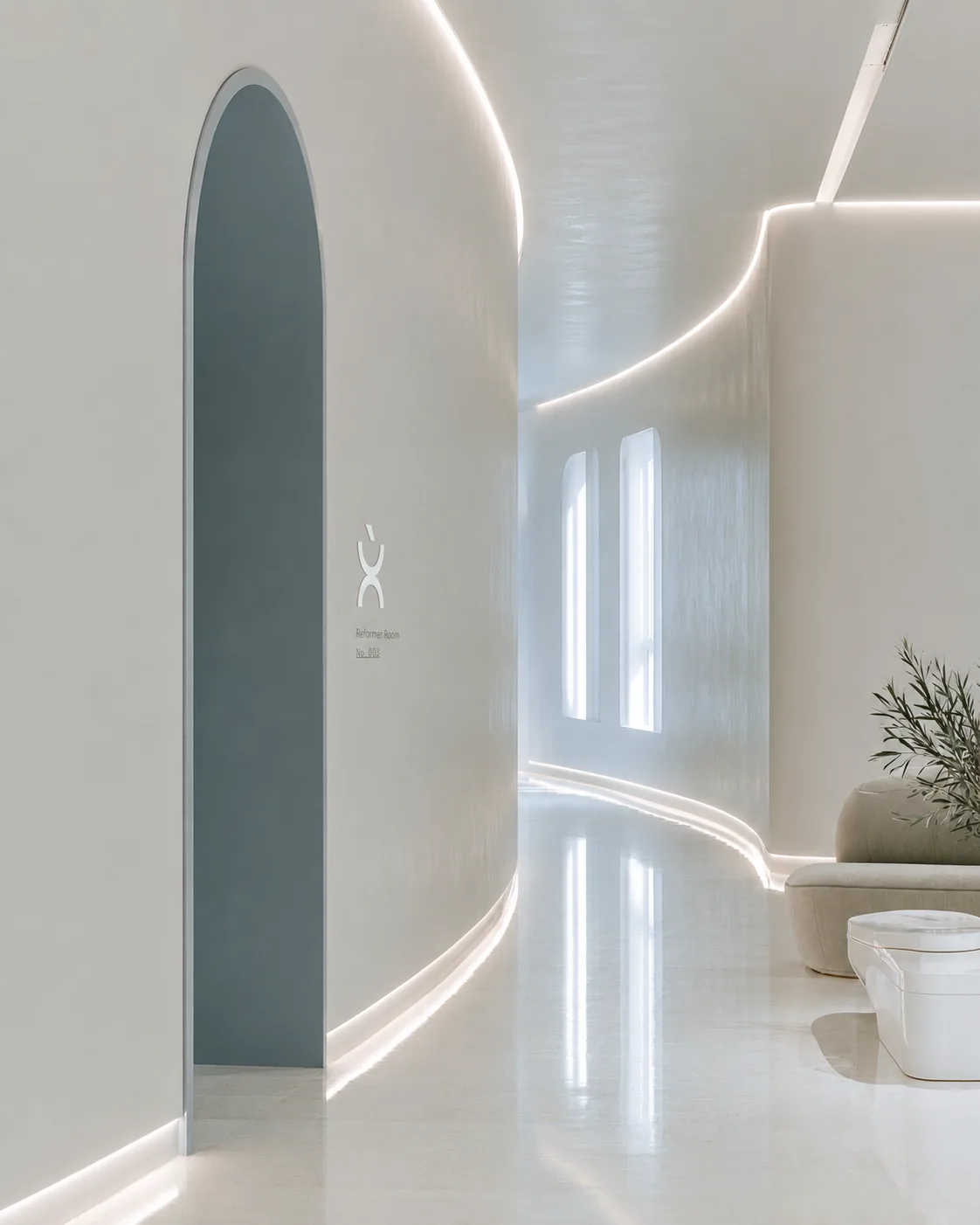 NÙE corridor with arched wayfinding signage
