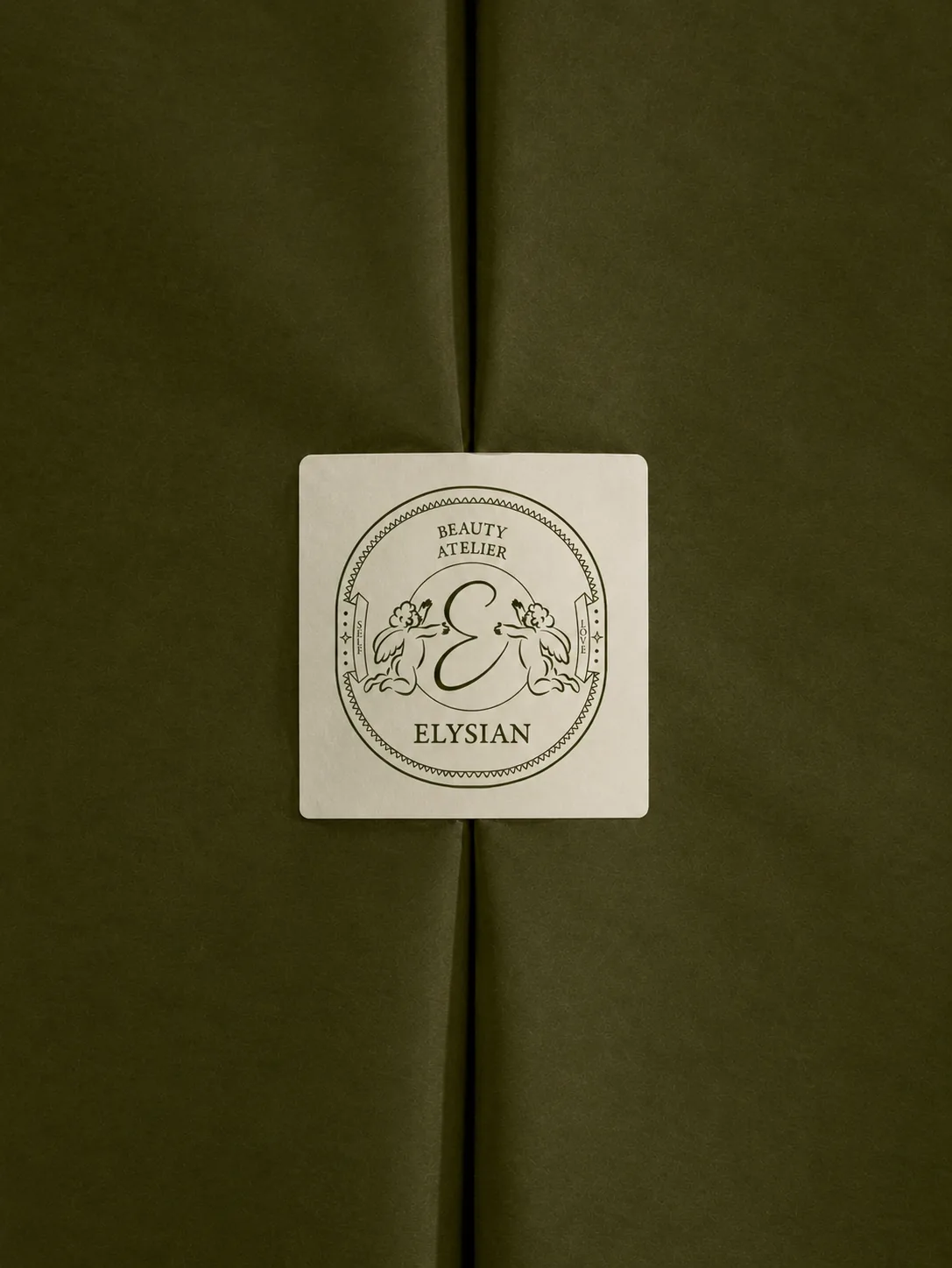 Elysian seal sticker applied to olive-wrapped packaging